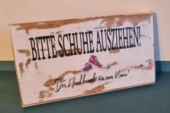 Bitte Schuhe ausziehen